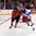 ST. CATHARINES, CANADA - JANUARY 14: Canada's Ryleigh Houston #15 and Russia's Sofya Senchukova #27 battle during semifinal round action at the 2016 IIHF Ice Hockey U18 Women's World Championship. (Photo by Jana Chytilova/HHOF-IIHF Images)

